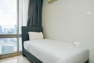 Comfortable Deluxe 2BR at The Empyreal Condominium Epicentrum Apartment By Travelio - 9