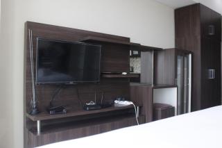 Modern Studio Room at Tamansari La Grande Apartment By Travelio - Bandung - 7