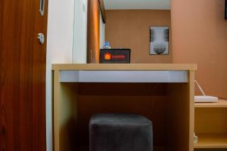 Minimalist and Homey 1BR Grand Kamala Lagoon Apartment By Travelio - Bekasi - 4