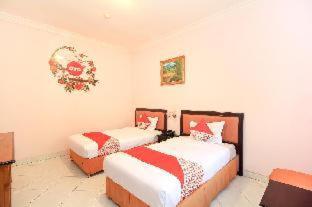 Kartika Syariah Homestay by Stayku - 9