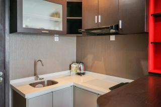 Modern Design 1BR Apartment at Brooklyn Alam Sutera By Travelio - 1