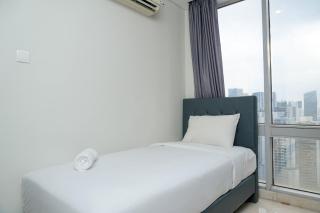 Elegant 2BR at Empyreal The Epicentrum Kuningan Apartment By Travelio - 1