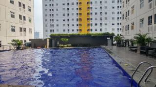 Minimalist 2BR Green Pramuka City Apartment near Shopping Mall By Travelio - 4