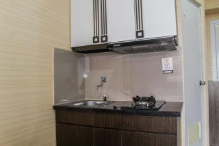 Minimalist 2BR Green Pramuka City Apartment near Shopping Mall By Travelio - 6