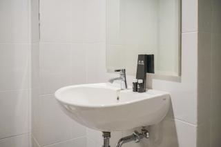 Minimalist and Comfortable 1BR Casa De Parco Apartment By Travelio - 3