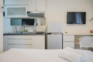 Minimalist Pool View Low Rise Studio @ Paramount Skyline Apartment By Travelio - 7