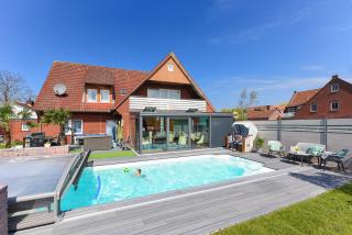 Ferienwohnung Haus zum Seehund mit Pool und Frühstücksoption - Bensersiel - 1