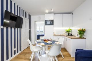 Apartament 1B Niebieskie Apartamenty Poddąbie z basenem krytym, odkrytym, salą zabaw, animacjami - 0