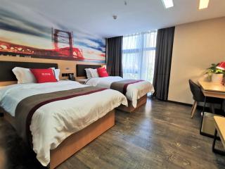 Thank Inn Chain Hotel Guangan Huaying Phoenix City - Huaying - 1