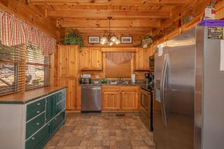 Log Inn, 5 bed 3 bath group cabin in Gatlinburg with game room and hot tub, seasonal resort pool - 1