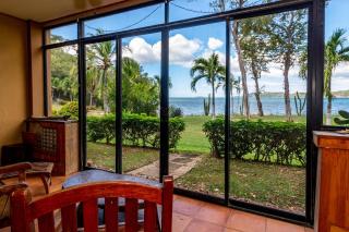 Warm Interiors and Orange Hues on Ground Floor in Front of Beach - Playa Flamingo - 0