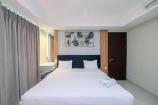 Cozy 2BR Apartment Nine Residence with City View By Travelio - 0