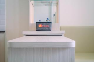 Chic and Cozy 2BR Apartment at Green Pramuka City By Travelio - 1