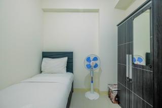 Chic and Cozy 2BR Apartment at Green Pramuka City By Travelio - Jacarta - 5