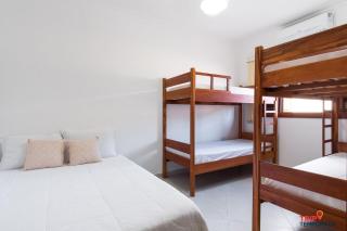 Casa na Praia Grande com piscina, churrasqueira e ar condicionado - 04 dormitórios - 6