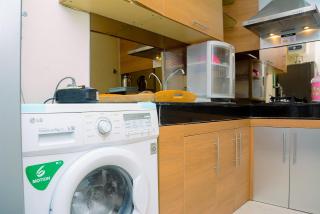 Modern and Luxurious 2BR Essence Dharmawangsa Apartment By Travelio - 1