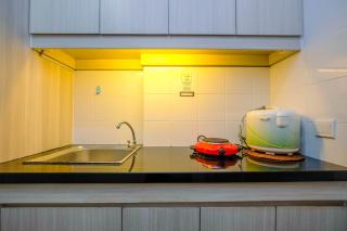 Modern Style Studio Apartment at Azalea Suites with City View By Travelio - Bekasi - 7