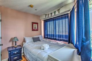 Colorful Escape with Ocean View and Pool Access - 1