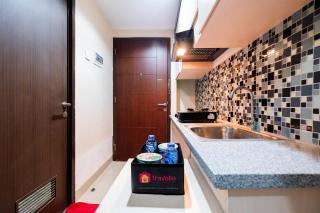 Cozy Studio Room Grand Dhika Apartment By Travelio - Bekasi - 2