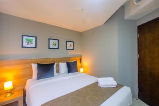 Fully Furnished with Comfortable 1BR Apartment at Mustika Golf Residence By Travelio - Bekasi - 4
