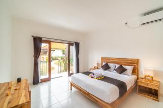 Wooden Puri Guesthouse - Uluwatu - 5