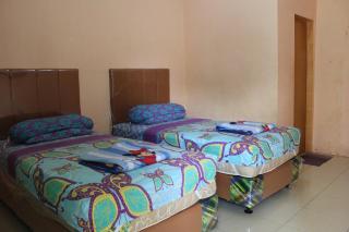 Penginapan Transit Tomato - Tanjungmorawa - 1