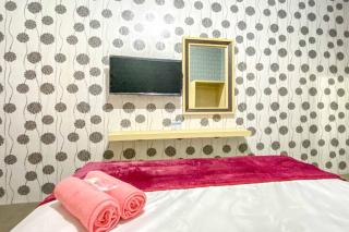 Tini's Guest House Malang Mitra RedDoorz - Betek - 3