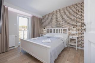 Apartamenty Słoneczne Tarasy by Noclegi Renters - Dziwnówek - 3