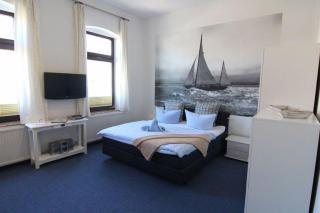 Kapitaenshaus-Lassen-Zimmer-Neptun - 9