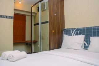 Beautiful 2BR with Direct Access to Pool Green Bay Pluit Apartment By Travelio - Jakarta - 1
