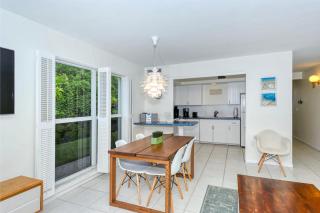 LaPlaya 101A Step out to the beach from your screened lanai Light and bright end unit - Longboat Key - 4