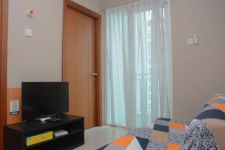 Warm and Cozy 2BR Apartment Woodland Park Residence By Travelio - 3