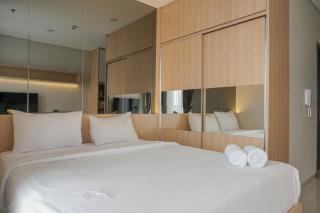 Fully Furnished with New Design Studio Ciputra International Apartment By Travelio - 9