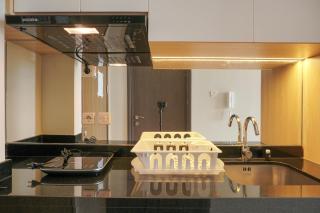 Fully Furnished with New Design Studio Ciputra International Apartment By Travelio - 3
