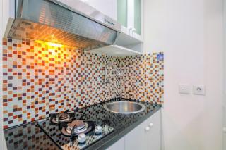 Relaxing 2BR at Green Pramuka Apartment By Travelio - 6