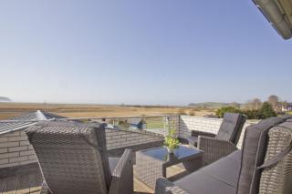 Balkon mit Meerblick, ruhige Lage - Ferienhaus Distelfink FeWo 01 - Groß Zicker - 1