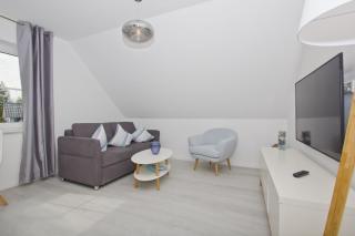 Ferienwohnung mit Meerblick und Gartennutzung - Haus Inselwind FeWo MEERduft - Groß Zicker - 1