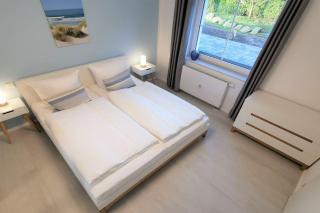 moderne Ferienwohnung mit eigener Terrasse - Haus Inselwind FeWo MEERferien - Groß Zicker - 2