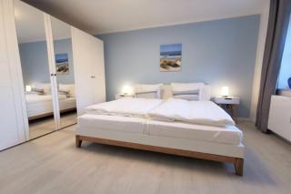 moderne Ferienwohnung mit eigener Terrasse - Haus Inselwind FeWo MEERferien - Groß Zicker - 1
