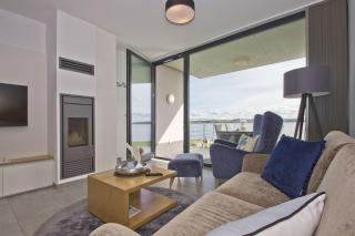 eigene Sauna, moderne Ferienwohnung in Wassernähe mit Meerblick - Ferienwohnung Heimathafen, gratis Nutzung vom AHOI Erlebnisbad und Sauna in Sellin - Alt Reddevitz - 3