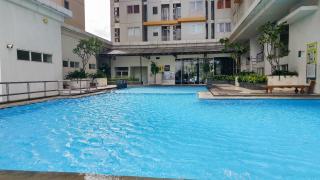 Cozy Living 1BR at Pakubuwono Terrace Apartment By Travelio - 5