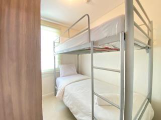 Private & Bright 2BR Apartment at Parahyangan Residence near Nara Park By Travelio - 9