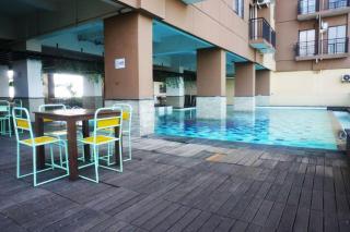 Comfy & Well Appointed 2BR at Tamansari Panoramic Apartment By Travelio - Bandung - 3