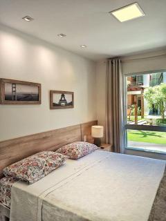 Guarajuba Porto Smeralda Village C02, térreo - GUARAJUBA TEMPORADA, viva mais de uma experiência de hospedagem conosco! 130m da praia - 1