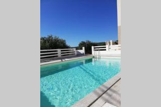 Trilocale vista mare con piscina a Badesi - 1