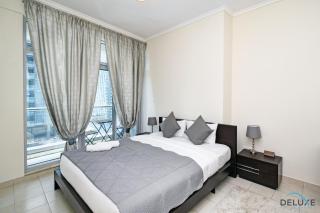 Steps Away From the Beach & Entertainment Hubs 1BR Unit, Torch Tower, Dubai Marina by Deluxe Holiday Homes - Dubai - 8