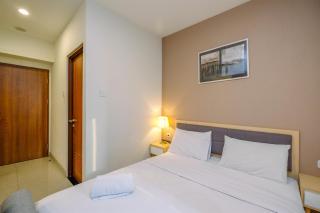 Modern and Spacious Studio with City View @ Grand Kamala Lagoon Apartment By Travelio - 1