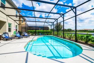 Stunning Lake View from South Facing Extended Pool Deck with Games Room on Gated Solterra Resort - 4