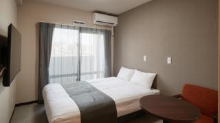 New Normal Hotel in MATSUYAMA ニューノーマルホテルイン松山 - Naha - 0