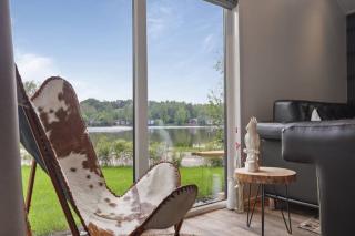 Luxe chalet in Oosterwolde in FRIESLAND, op rustig park met uitzicht op meer en strandje - Oosterwolde - 5